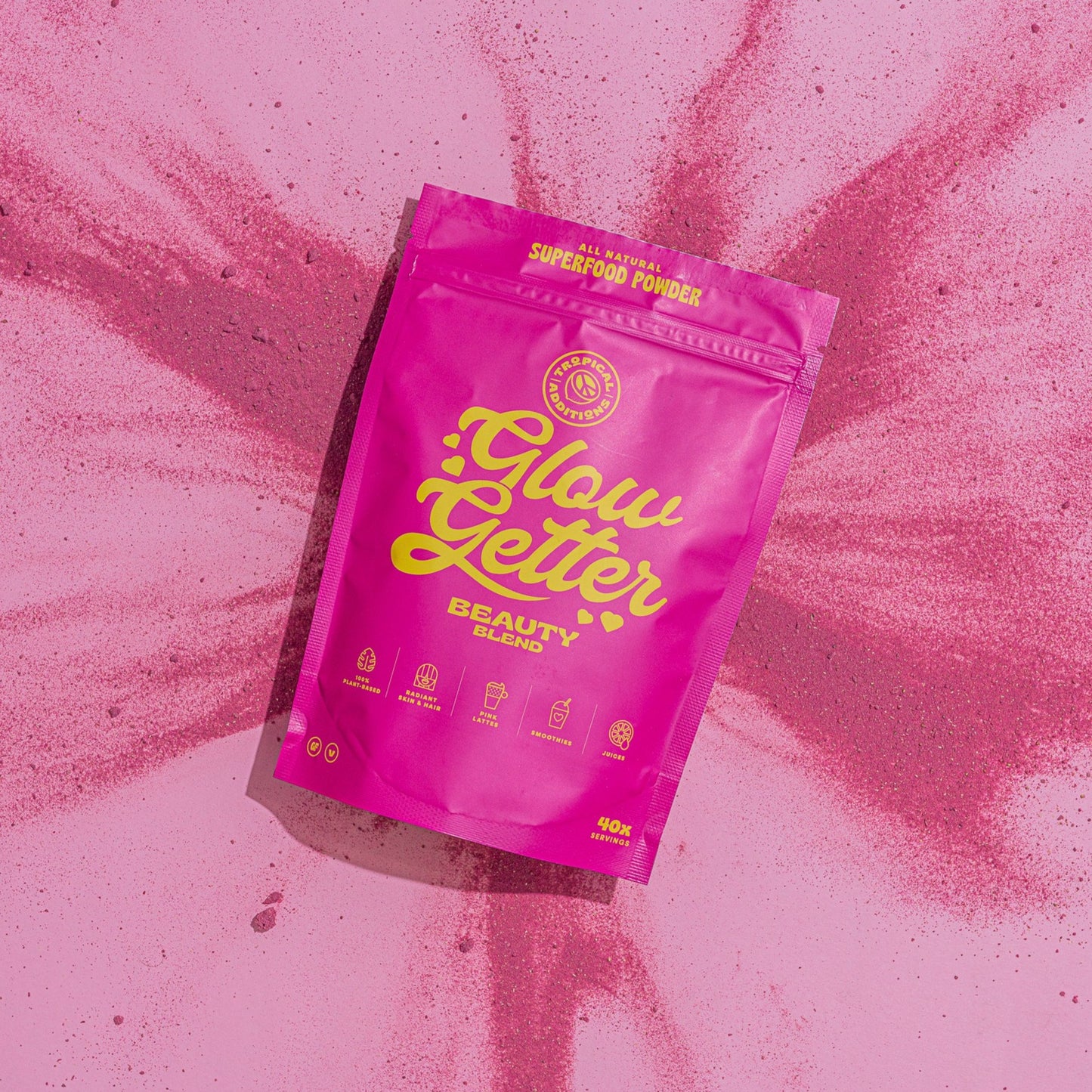 
                  
                    Beauty Boosting Superfood Blend | Glow Getter | Tropical Additions - packet placed on the powder spread  out
                  
                
